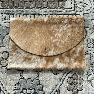 Calf hide clutch